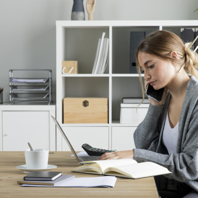 medium-shot-woman-working-with-laptop